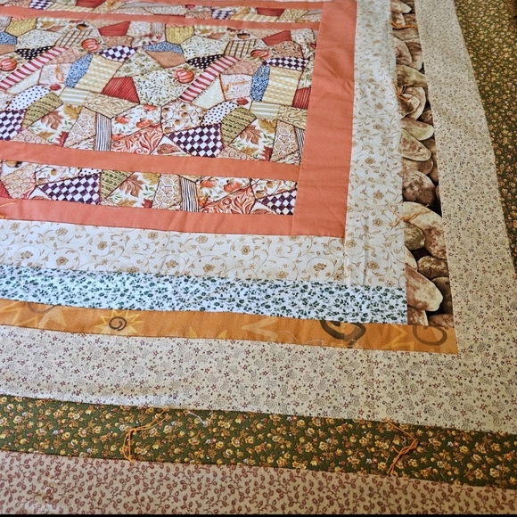 NEW, never used 77" X 60" Fall Themed Quilt. The color scheme Is fall themed. - Picture 3 of 5